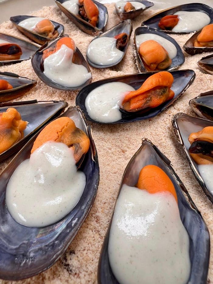 Mussels on the half shell with a creamy sauce