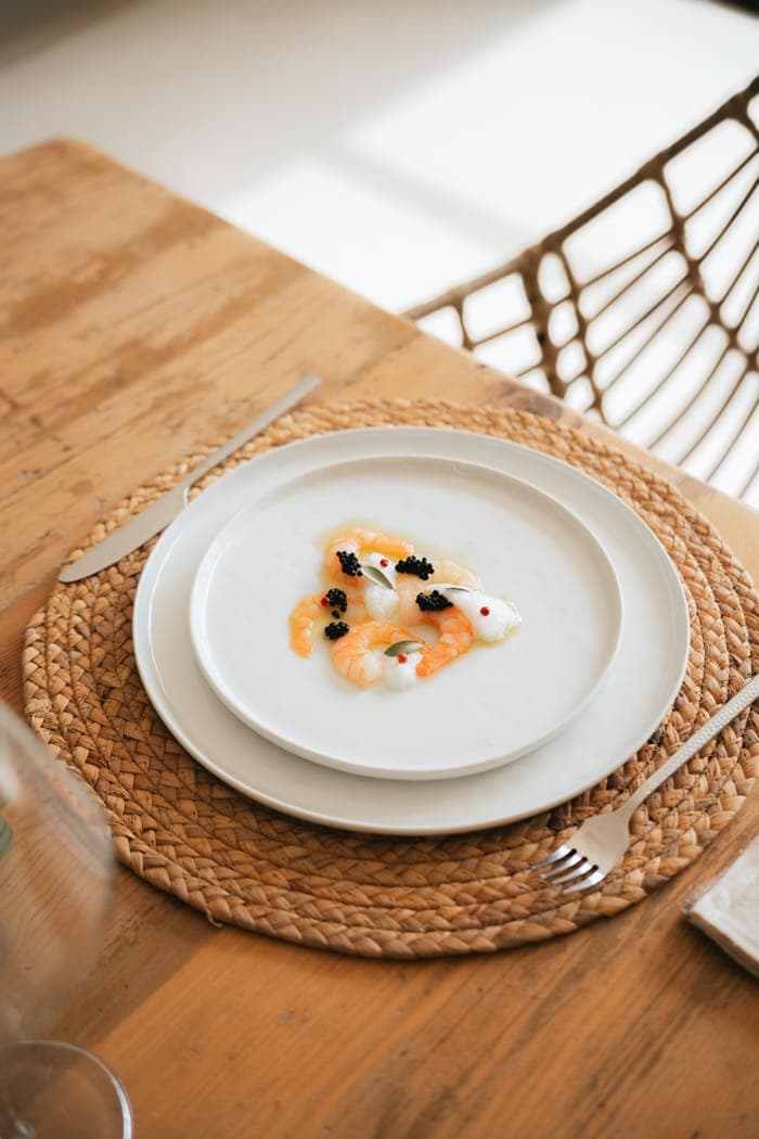 Prawns with black caviar and citrus foam, fine-dining plating