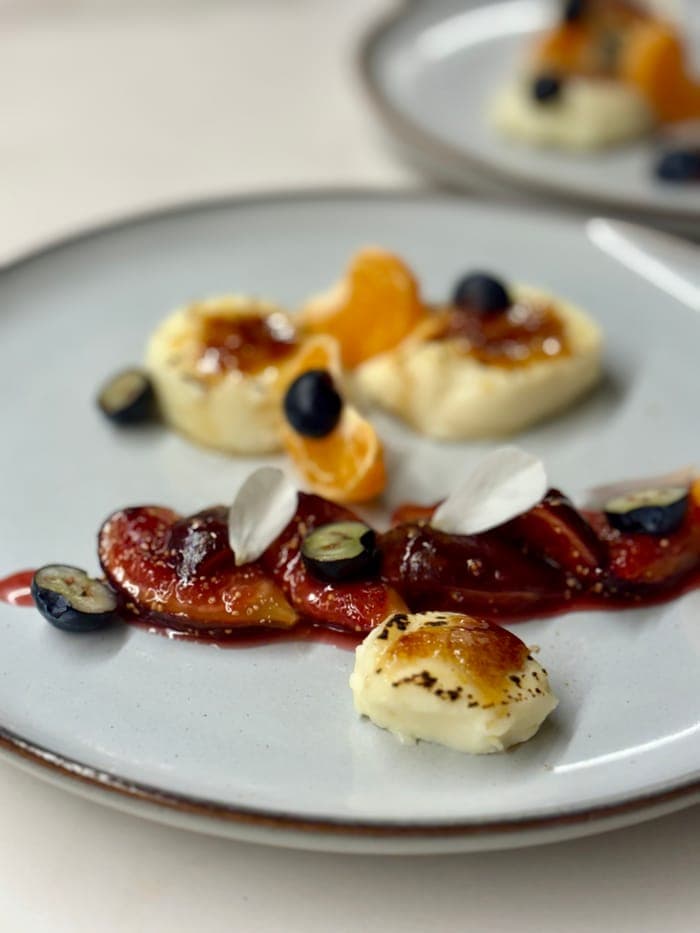 Charred cheesecake bites with fig, blueberry and tangerine