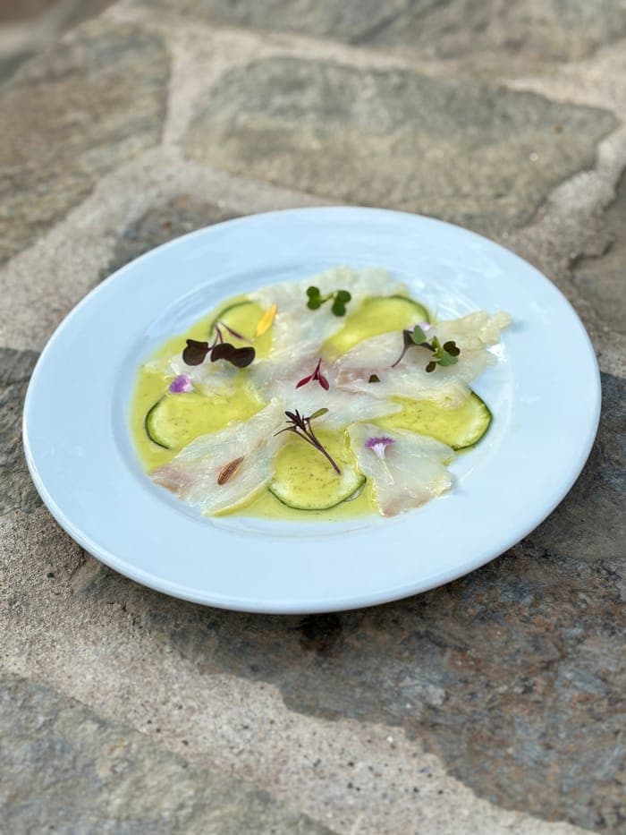 Fish carpaccio with cucumber and a citrus dressing